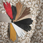 Peccary leather colour samples in glove shape, showing the range of shades NM Gloves works in