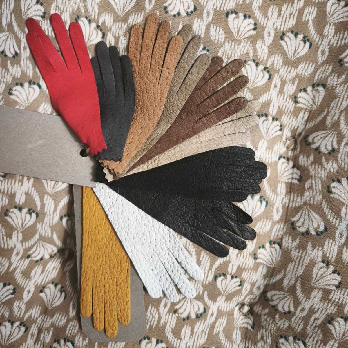 Peccary leather colour samples in glove shape, showing the range of shades NM Gloves works in