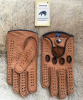 Men's cork peccary driving gloves with black hand-sewn stitching and piping, open knuckles and snap closure