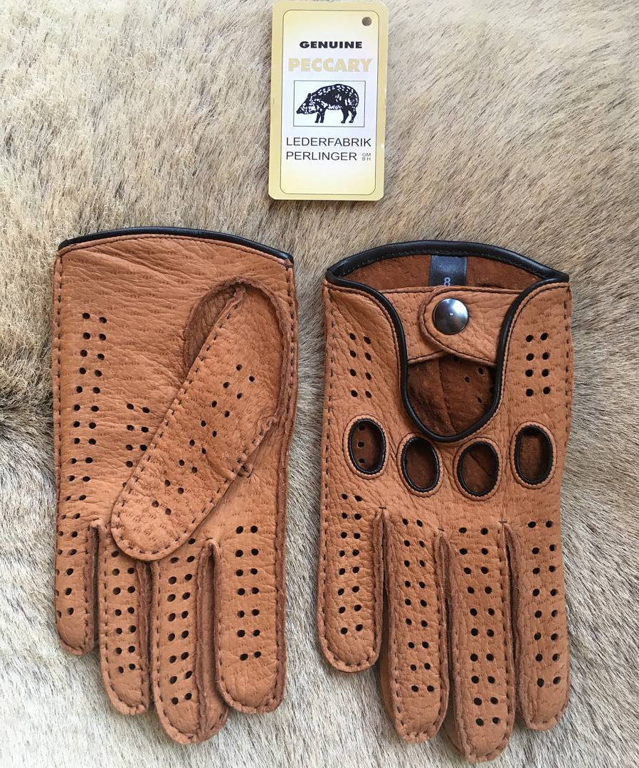 Men's cork peccary driving gloves with black hand-sewn stitching and piping, open knuckles and snap closure