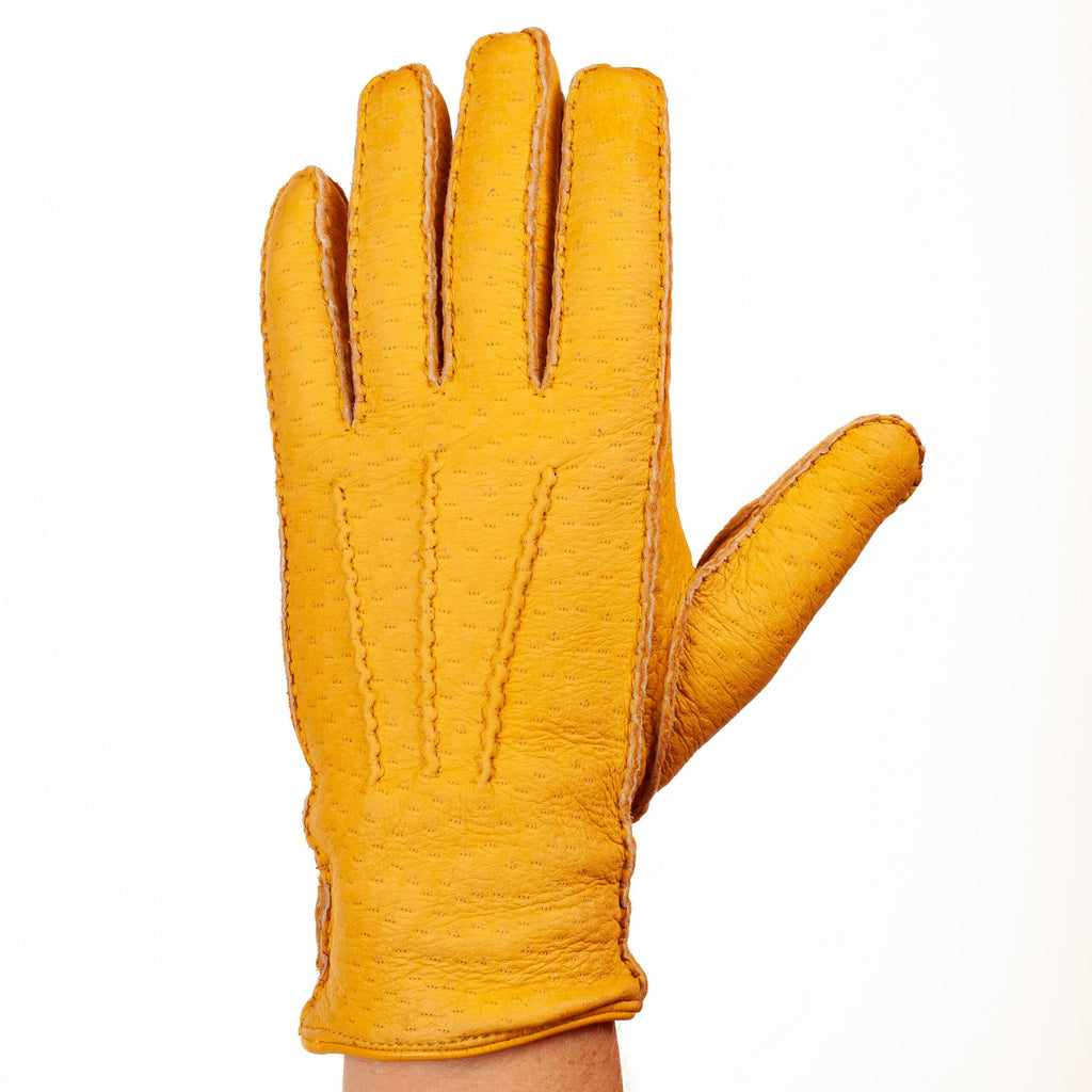 Yellow peccary winter glove with hand-stitched points on the back, cashmere lined with strap closure