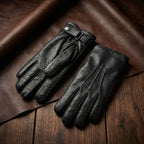 Black peccary winter gloves with strap closure and cashmere lining